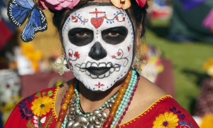 Woman wearing traditional outfits for Dios de Los Muertos, Day of the Dead, Hollywood Forever Cemetery