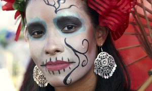 Woman wearing traditional outfits for Dios de Los Muertos, Day of the Dead, Hollywood Forever Cemetery