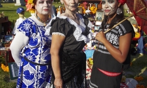 Woman wearing traditional outfits for Dios de Los Muertos, Day of the Dead, Hollywood Forever Cemetery