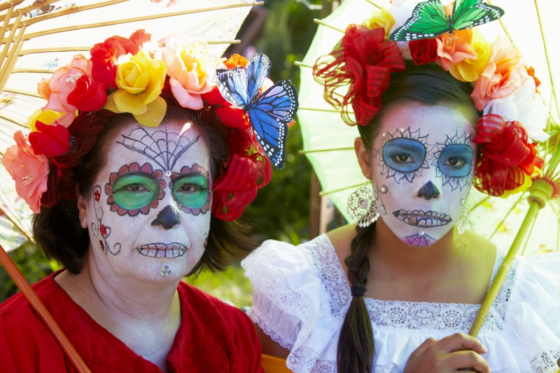 Mother and daughter dressed in costume at Day of the Dead (Dia de los Muertos) at Hollywood Forever Cemetery