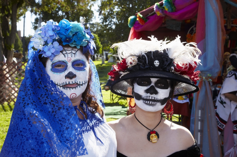Women dressed in costume at Day of the Dead (Dia de los Muertos) at Hollywood Forever Cemetery