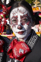 Woman dressed in costume at Day of the Dead (Dia de los Muertos) at Hollywood Forever Cemetery