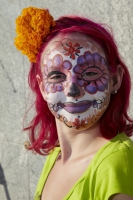 Portrait of girl with face painted at Day of the Dead (Dia de los Muertos) at Hollywood Forever cemetery